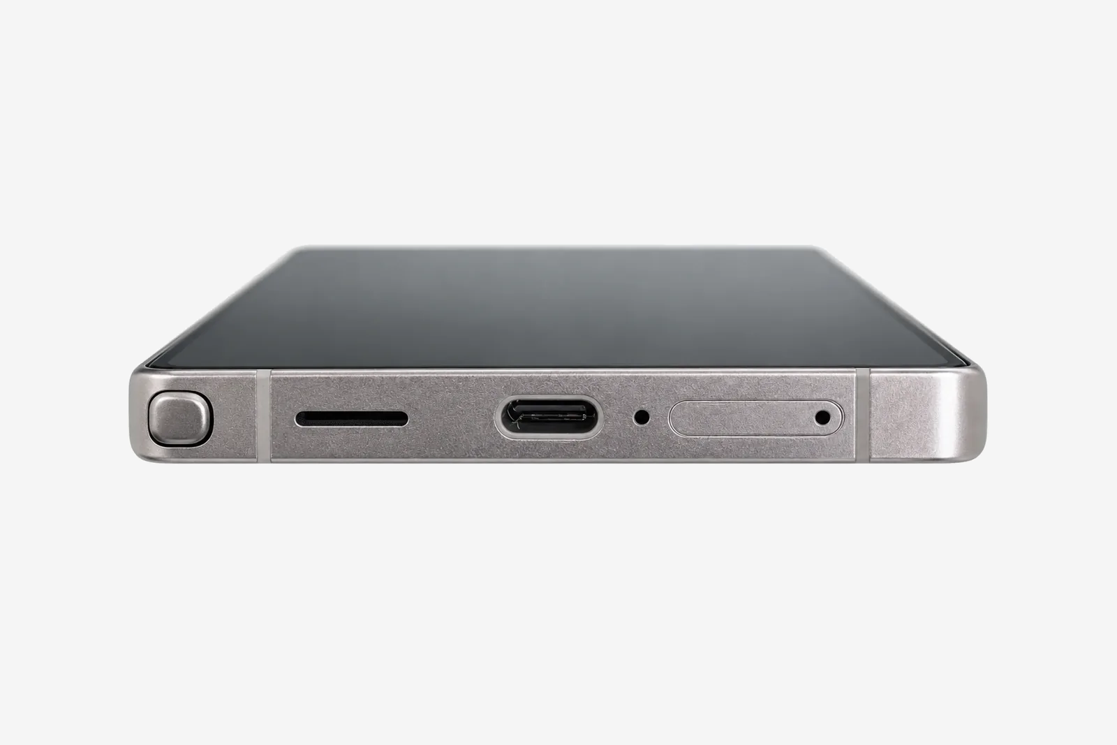 Unterkante eines Samsung Galaxy S25 Ultra mit sichtbarem USB-C-Anschluss, Lautsprecher und S Pen auf hellgrauem Hintergrund